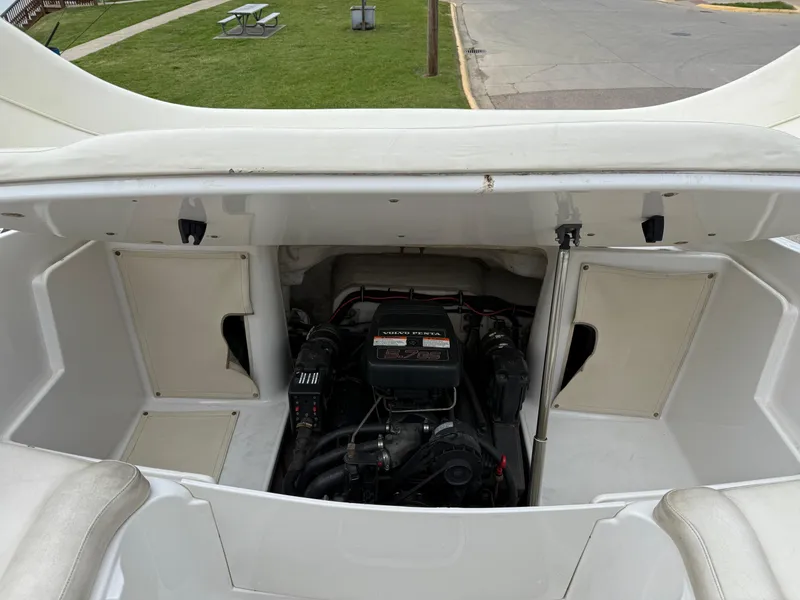 Slide: The Image of 1999 Chris-Craft 210 Bowrider engine compartment, showcasing the boat's interior mechanics. - 26