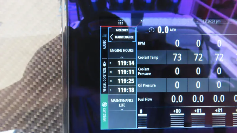 Slide: The Image of Display screen of 2023 Nor-Tech 390 Sport Center Console showing engine metrics and maintenance data. - 20