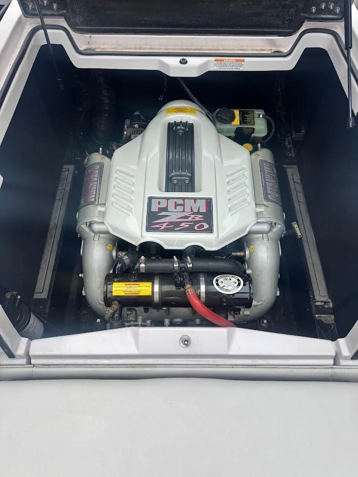 Slide: The Image of 2013 Nautique Super Air G23 engine compartment with PCM 450 engine. - 19