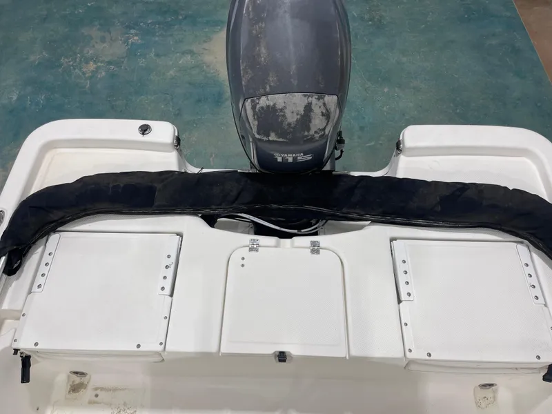 Slide: The Image of 2012 Sea Fox 180XT boat with Yamaha 115 engine, rear deck view. - 13
