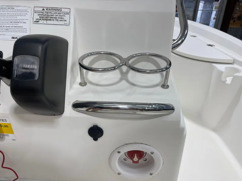 Slide: The Image of 2012 Sea Fox 180XT boat console with Yamaha throttle and cup holders. - 16