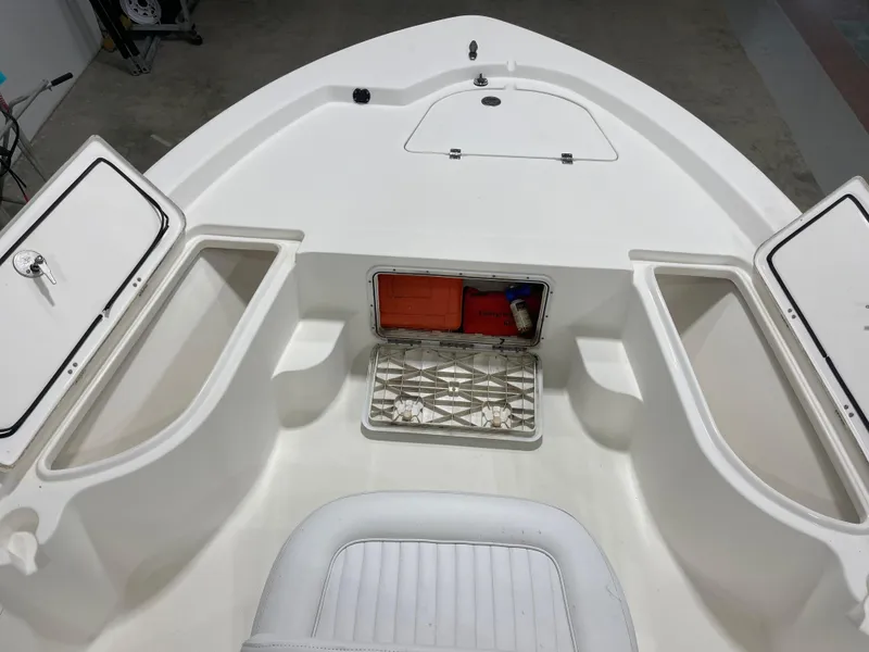 Slide: The Image of 2012 Sea Fox 180XT boat interior with open storage compartments. - 20