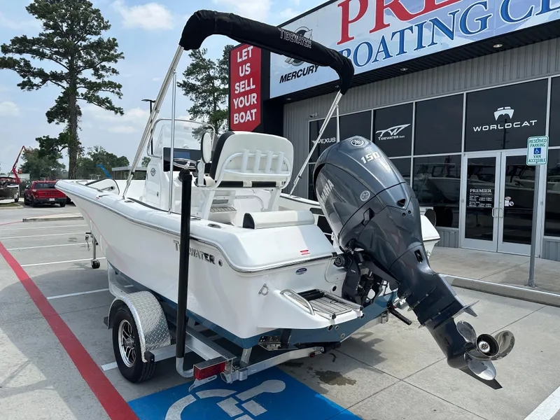 Slide: The Image of 2025 Tidewater 198CC boat with Yamaha engine at dealership, ready for sale. - 10