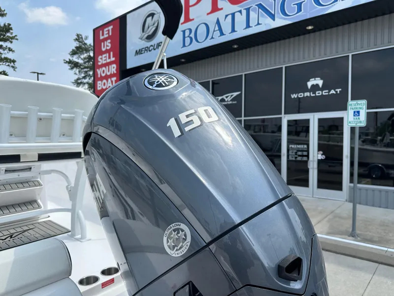 Slide: The Image of 2025 Tidewater 198CC boat with Yamaha 150 engine at a dealership. - 11