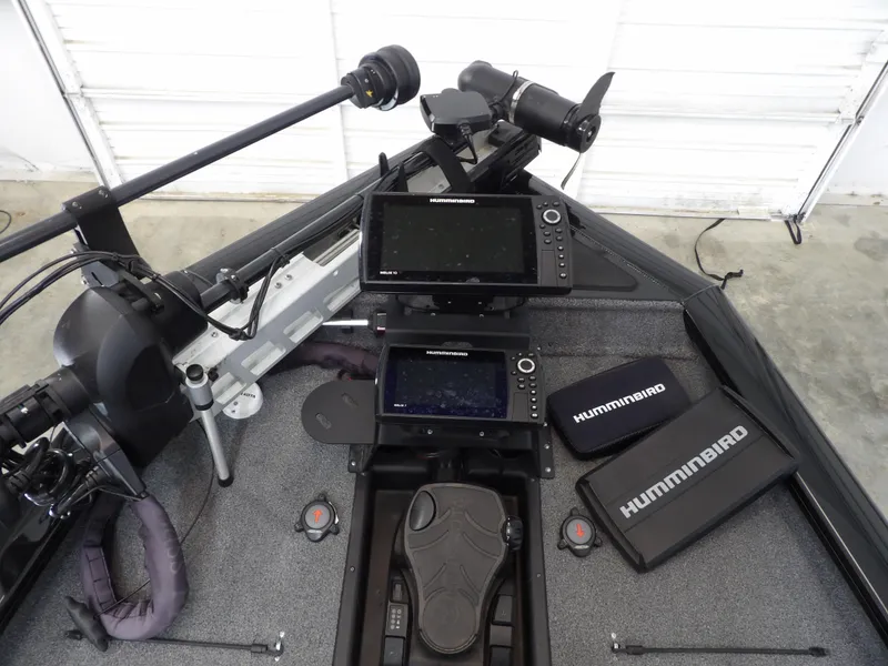 Slide: The Image of 2023 Tracker PRO190TX boat dashboard with Humminbird electronics and trolling motor. - 18