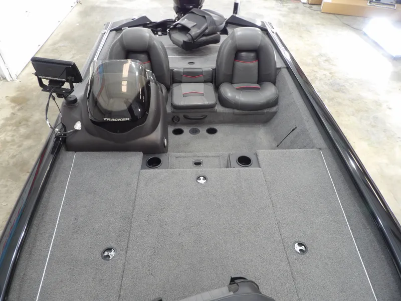 Slide: The Image of 2023 Tracker PRO190TX boat interior with seating and control panel, featuring a sleek design. - 20