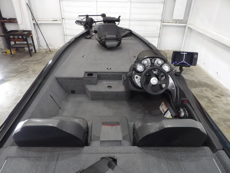 Slide: The Image of 2023 Tracker PRO190TX boat interior with steering console and seating. - 22