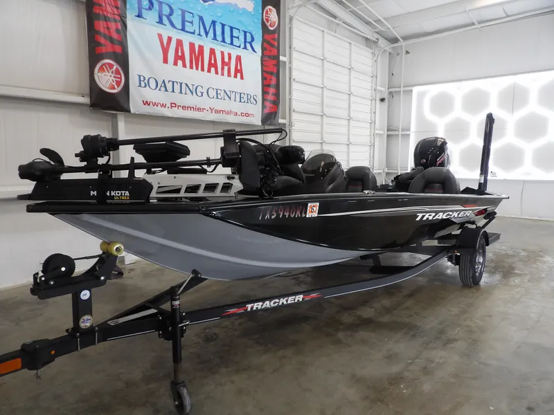 Slide: The Image of 2023 Tracker PRO190TX boat in showroom, displayed on trailer at Premier Yamaha Boating Centers. - 3