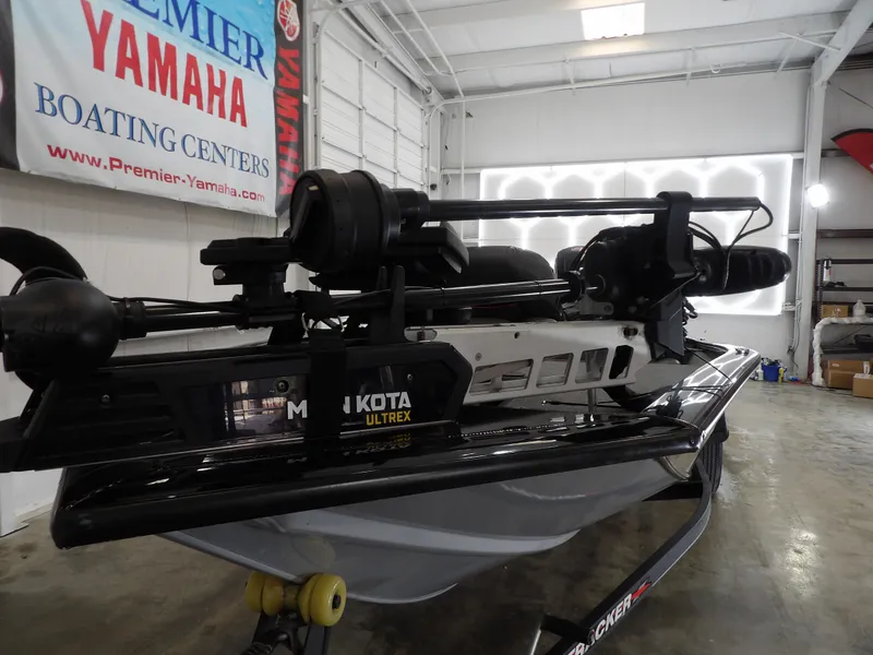 Slide: The Image of 2023 Tracker PRO190TX boat with Minn Kota Ultrex motor in a showroom. - 5