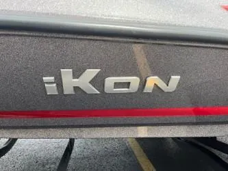Slide: The Image of 2024 iKon LX 21 logo on a metallic surface with red accent. - 12