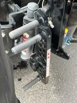 Slide: The Image of Close-up of iKon LX 21 machinery component with levers, 2024 model. - 14