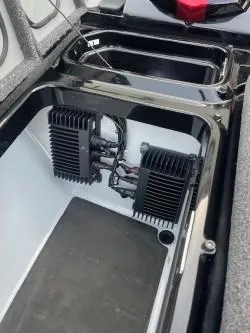 Slide: The Image of 2024 iKon LX 21 boat storage compartment with electronic components. - 19