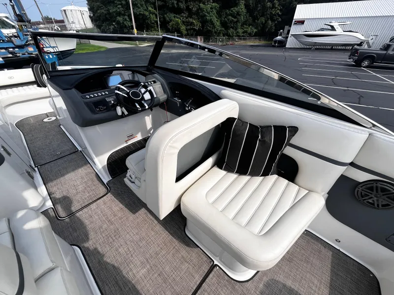 Slide: The Image of 2016 Cobalt R30 boat interior with sleek dashboard and plush seating. - 38