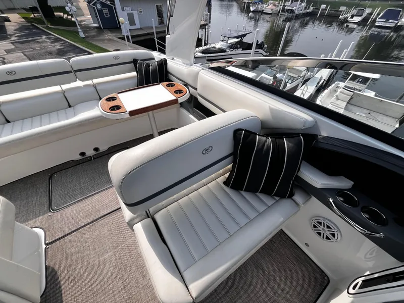 Slide: The Image of Luxurious 2016 Cobalt R30 boat interior with plush seating and elegant design. - 47