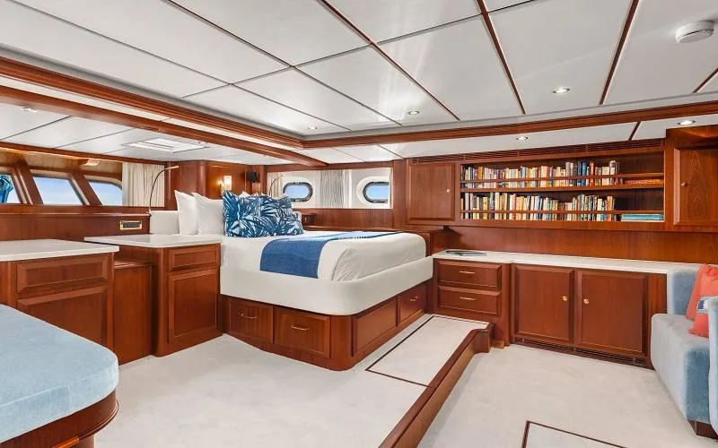 Slide: The Image of Luxurious Jongert Ketch 2002 yacht interior with elegant wood finish and cozy bedroom. - 11