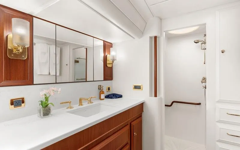 Slide: The Image of Luxurious bathroom on 2002 Jongert Ketch yacht with elegant fixtures and wood accents. - 13