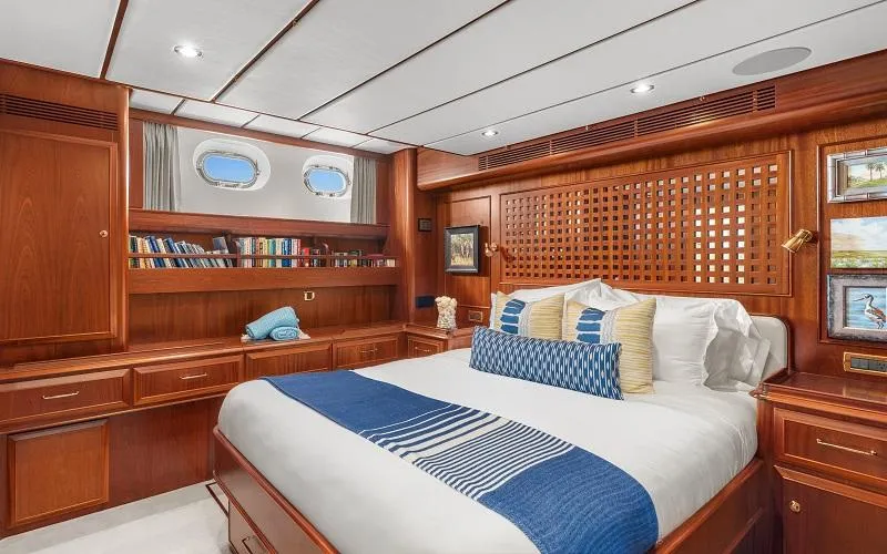 Slide: The Image of Luxurious Jongert Ketch 2002 yacht cabin with elegant wood finish and cozy bedding. - 14