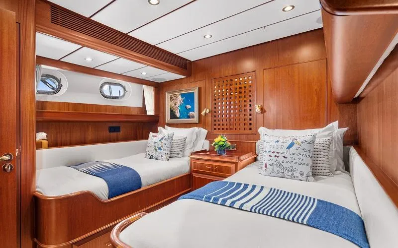 Slide: The Image of Luxurious 2002 Jongert Ketch cabin with twin beds, wooden interior, and nautical decor. - 16
