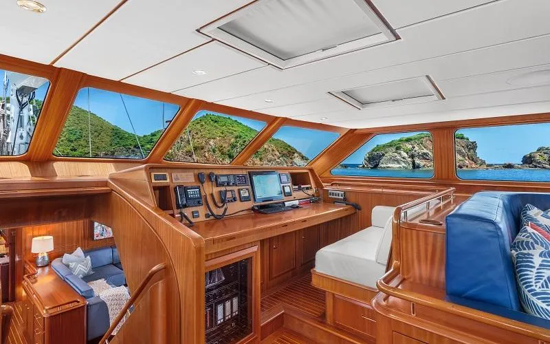 Slide: The Image of Luxurious 2002 Jongert Ketch yacht interior with navigation station and scenic ocean view. - 7