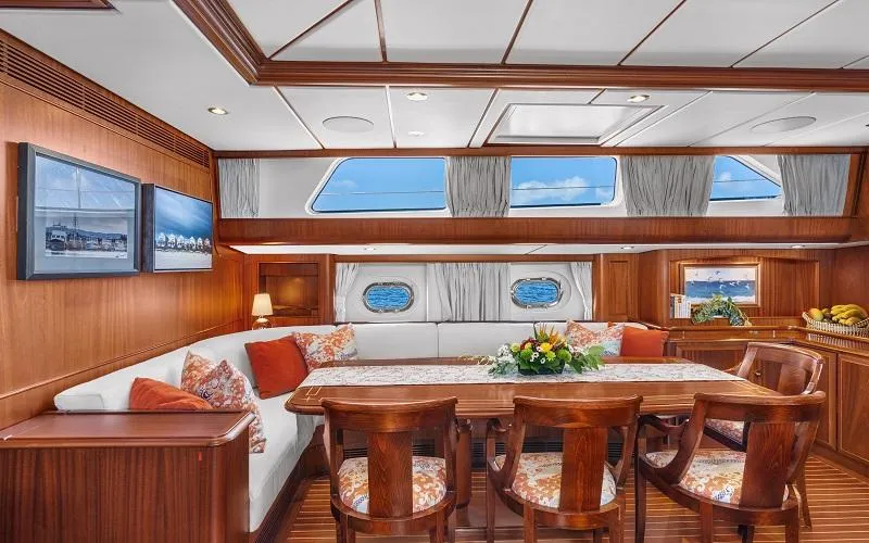 Slide: The Image of Luxurious 2002 Jongert Ketch yacht interior with elegant dining area and wooden furnishings. - 9