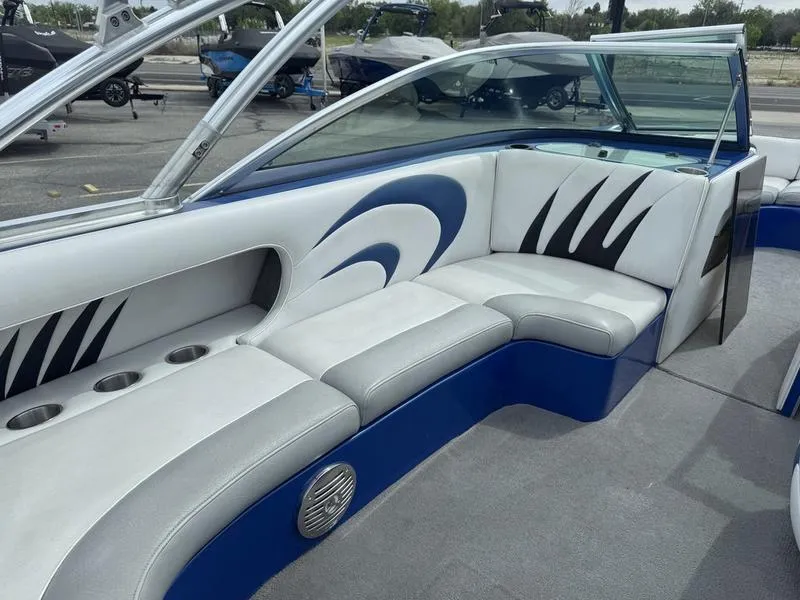 Slide: The Image of 2007 MB TOMCAT boat interior with stylish seating and modern design. - 9