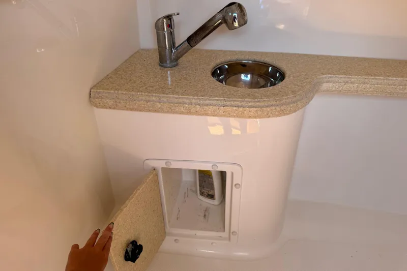 Slide: The Image of Boat interior with sink and storage, Deep Impact 36 DI, 2010 model. - 33