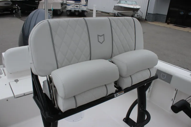 Slide: The Image of 2025 Sea Fox 228 Commander boat seating with diamond-stitched upholstery, showcasing luxury and comfort. - 13