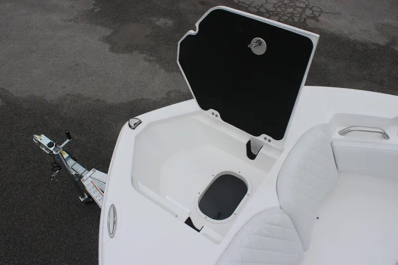 Slide: The Image of 2025 Sea Fox 228 Commander boat with open storage compartment and trailer hitch. - 18