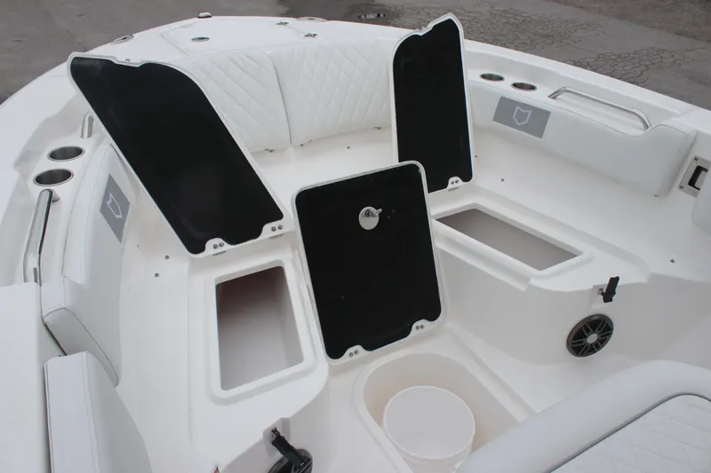 Slide: The Image of 2025 Sea Fox 228 Commander boat interior with open storage compartments. - 20