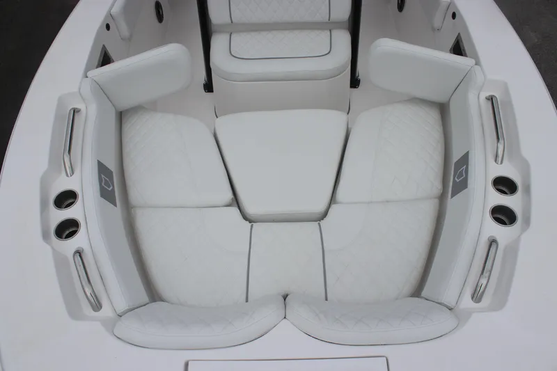 Slide: The Image of 2025 Sea Fox 228 Commander boat interior with white cushioned seating. - 23