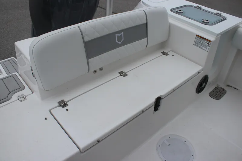 Slide: The Image of 2025 Sea Fox 228 Commander boat seating area with storage compartment. - 7