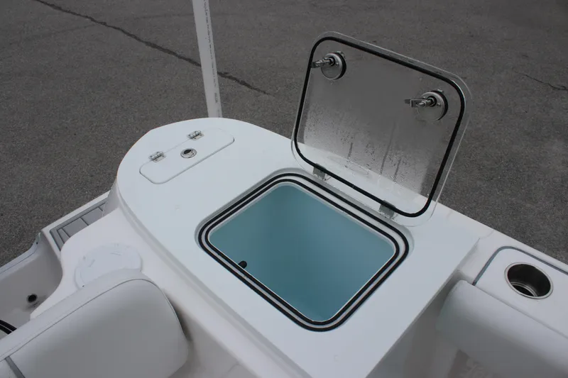 Slide: The Image of 2025 Sea Fox 228 Commander boat with open storage compartment on deck. - 9