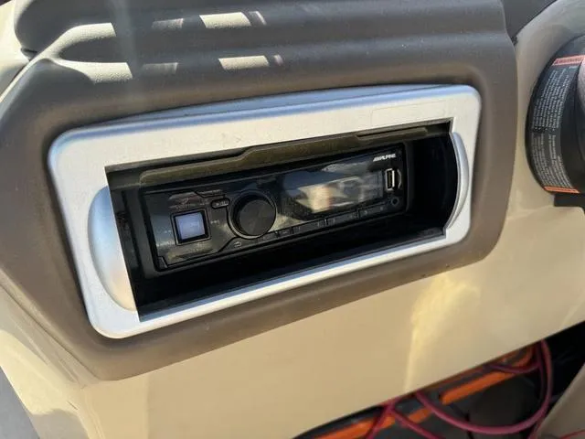 Slide: The Image of Alpine stereo system in 2014 SunCatcher V322 RC boat dashboard. - 12