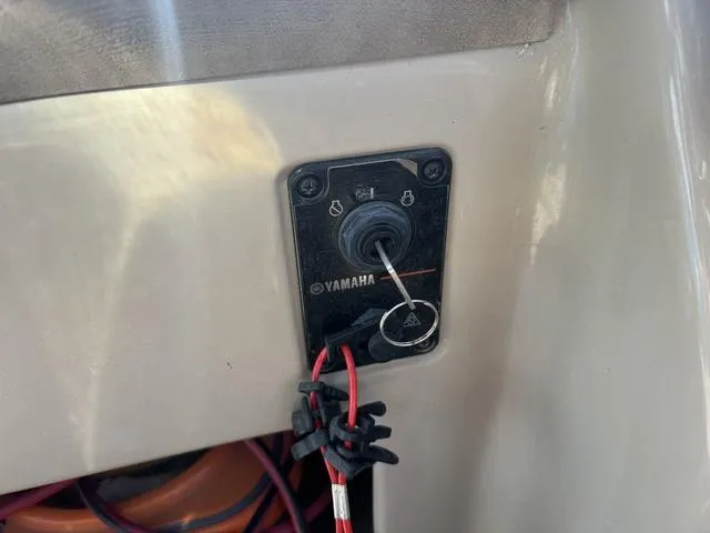 Slide: The Image of Yamaha ignition switch on 2014 SunCatcher V322 RC boat dashboard. - 16