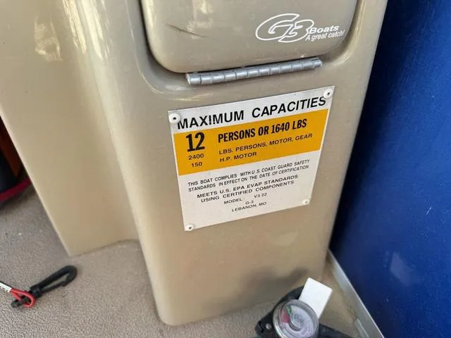 Slide: The Image of 2014 SunCatcher V322 RC boat capacity label, maximum 12 persons or 1640 lbs. - 18