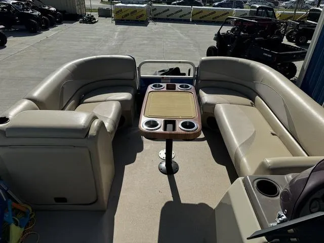 Slide: The Image of 2014 SunCatcher V322 RC pontoon boat interior with seating and table. - 25