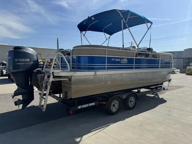 Slide: The Image of 2014 SunCatcher V322 RC pontoon boat with Yamaha motor on trailer. - 6