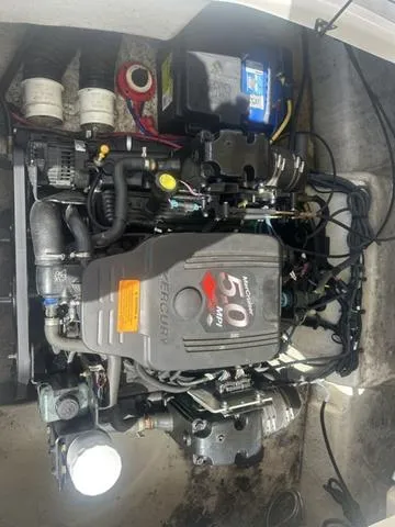 Slide: The Image of 2008 Chaparral Sunesta 224 boat engine, featuring a Mercury 5.0 MPI motor. - 22