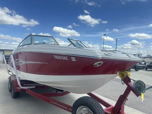 Slide: The Image of 2008 Chaparral Sunesta 224 boat on trailer under blue sky with clouds. - 4