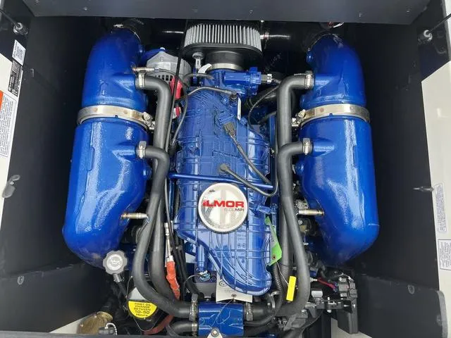 Slide: The Image of 2024 MasterCraft XT20 engine with blue components and Ilmor branding. - 43