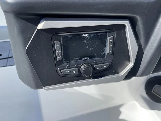 Slide: The Image of Control panel of 2024 Axis Wake Research T220-R boat, featuring a sleek design. - 13