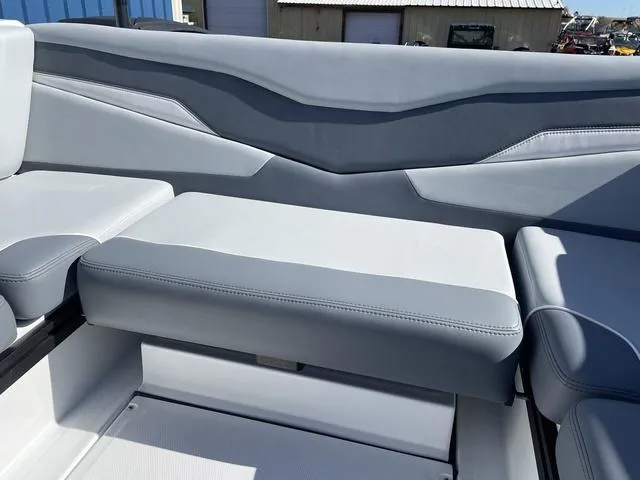 Slide: The Image of 2024 Axis Wake Research T220-R boat interior with sleek gray seating design. - 22
