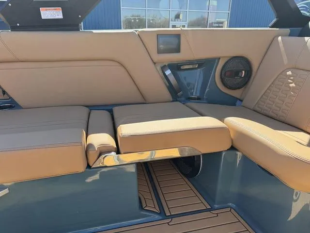 Slide: The Image of 2025 MasterCraft X24 interior with tan leather seats and modern design elements. - 25