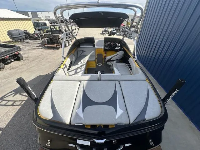 Slide: The Image of 2006 MasterCraft X2 boat with sleek interior design and wakeboard tower. - 10