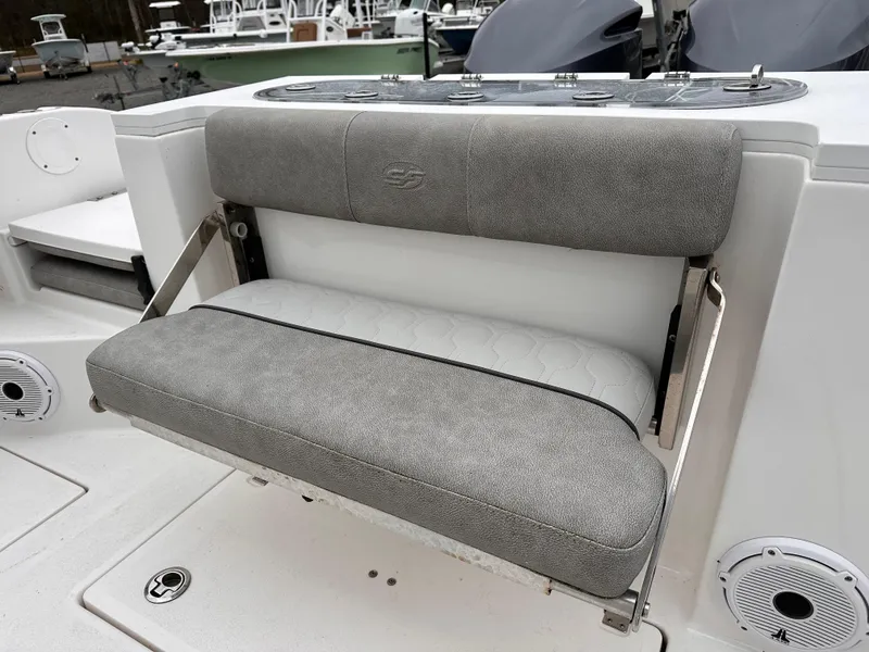 Slide: The Image of 2021 Sea Fox 288 Commander boat seat with gray upholstery and stainless steel frame. - 17
