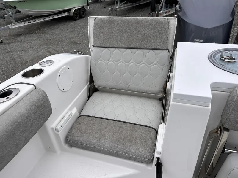 Slide: The Image of 2021 Sea Fox 288 Commander boat seat with gray and white cushioned design. - 18