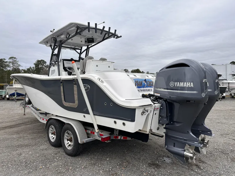 Slide: The Image of 2021 Sea Fox 288 Commander boat with dual Yamaha engines on a trailer. - 5