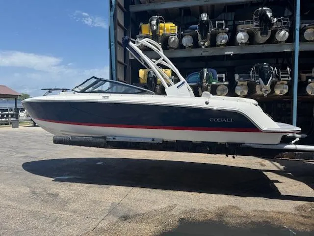 Slide: The Image of 2025 Cobalt CS22 boat in storage, featuring sleek design and modern architecture. - 10