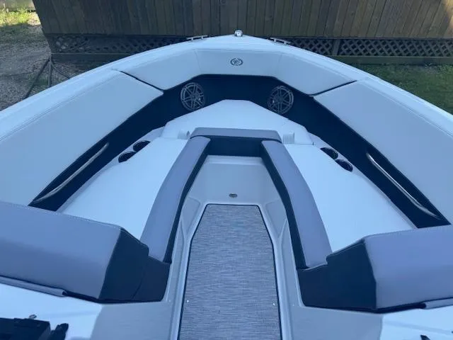 Slide: The Image of 2025 Cobalt CS22 boat interior with sleek seating and modern design. - 12