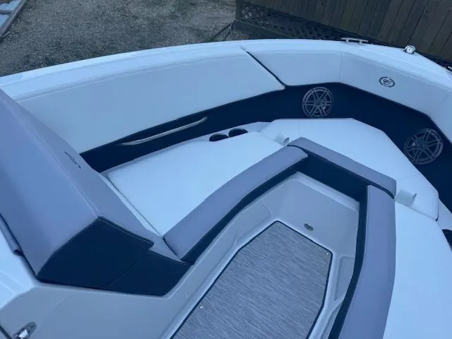 Slide: The Image of 2025 Cobalt CS22 boat interior with sleek seating and modern design. - 14